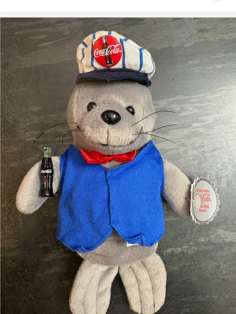 Coca Cola Gray Seal Plush Costume with Blue Vest and Red Bow